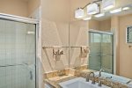 Full downstairs bathroom with a bath/shower combo